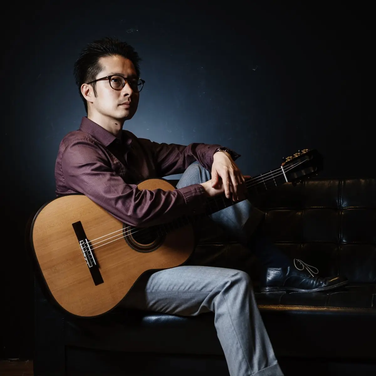 Ken Wei with guitar